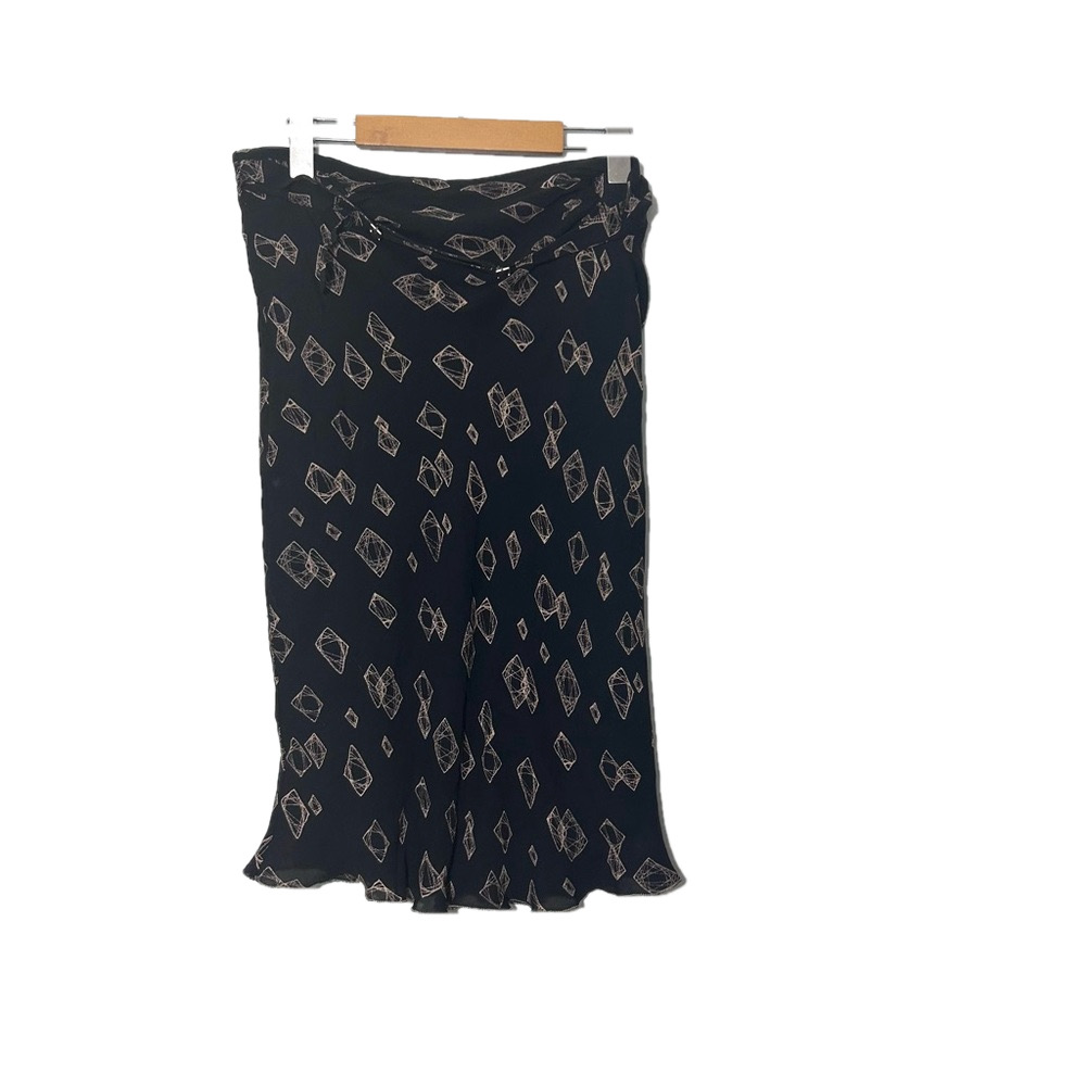 Max Studio 100 % silk print Black and Tan Skirt Womens
Size medium Silk Lined